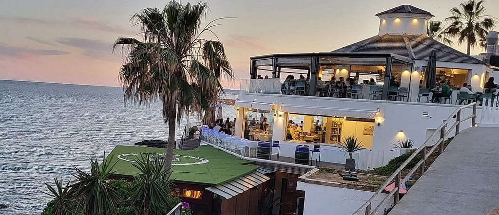 Perched on a cliff overlooking the sea Yucas Café & Bar is a trendy restaurant in Benalmadena