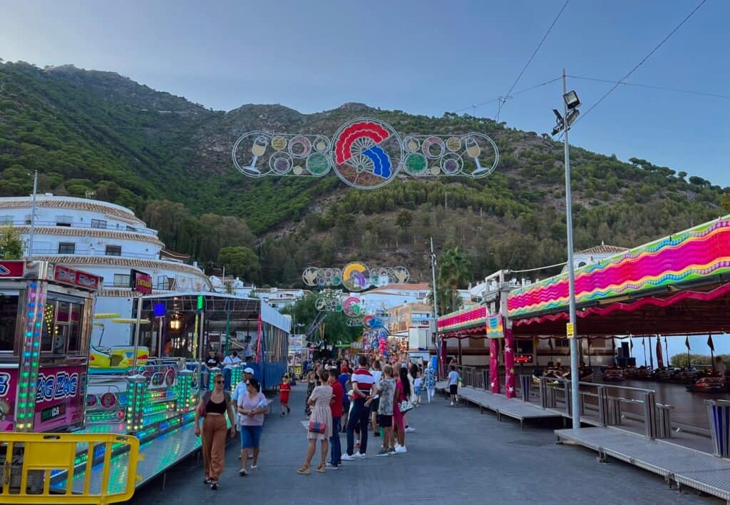 Colorful entertainment pavilions for kids at a traditional festival in Mijas Pueblo