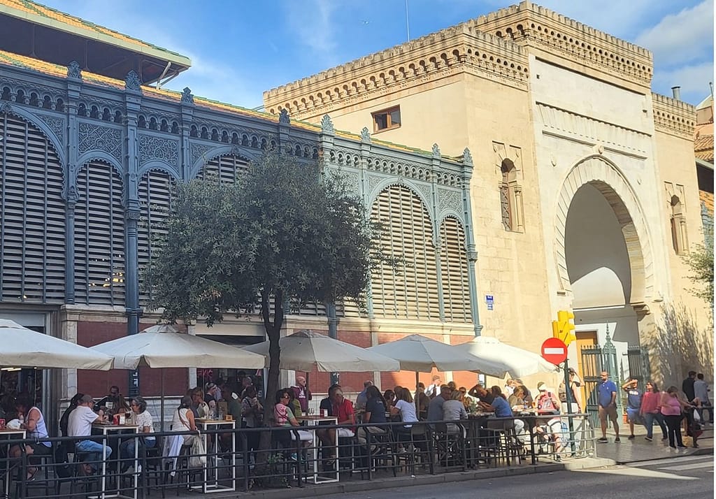 Outdoor cafe in downtown Malaga; affordable dining options keep cost of living in Spain low