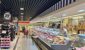 A scene in a popular supermarket; reasonable grocery prices help to keep the cost of living in Spain low, a new study finds