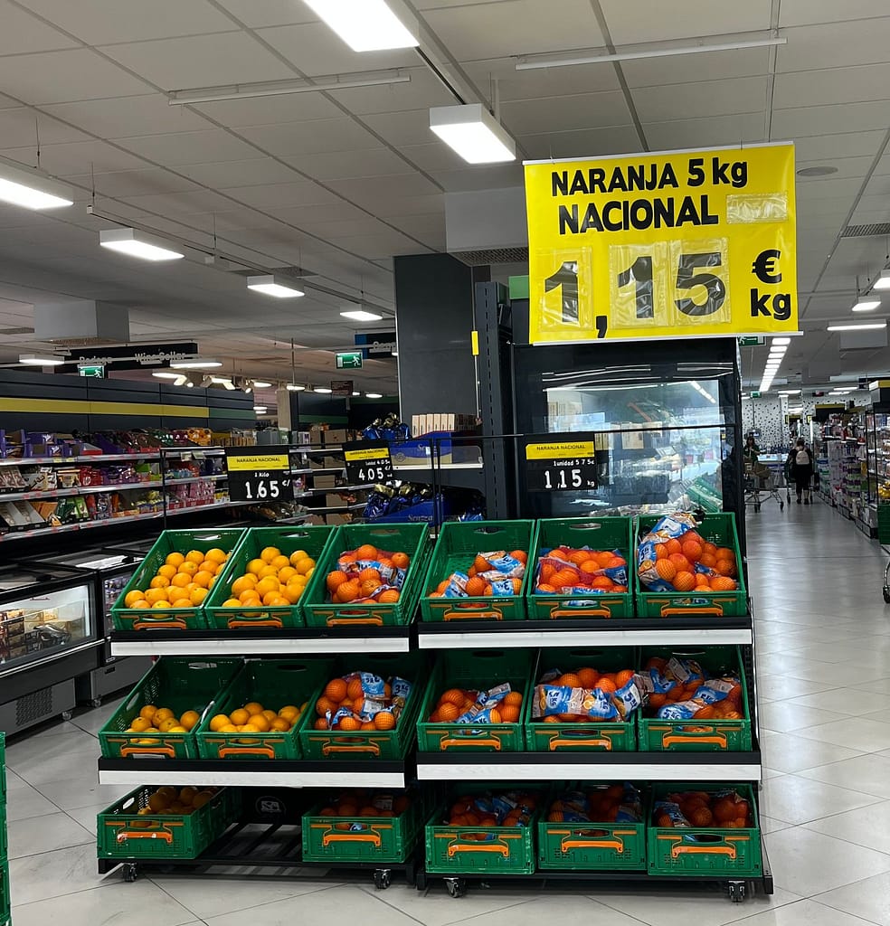A fruit display in Mercadona supermarket showing affordable prices