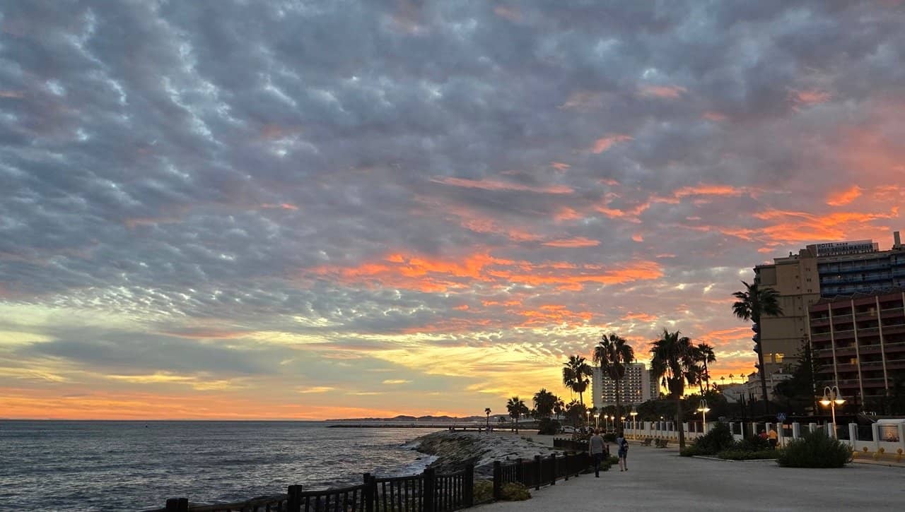 Watching a sunset on a Benalmadena promenade will turn your evening walk into an amazing experience